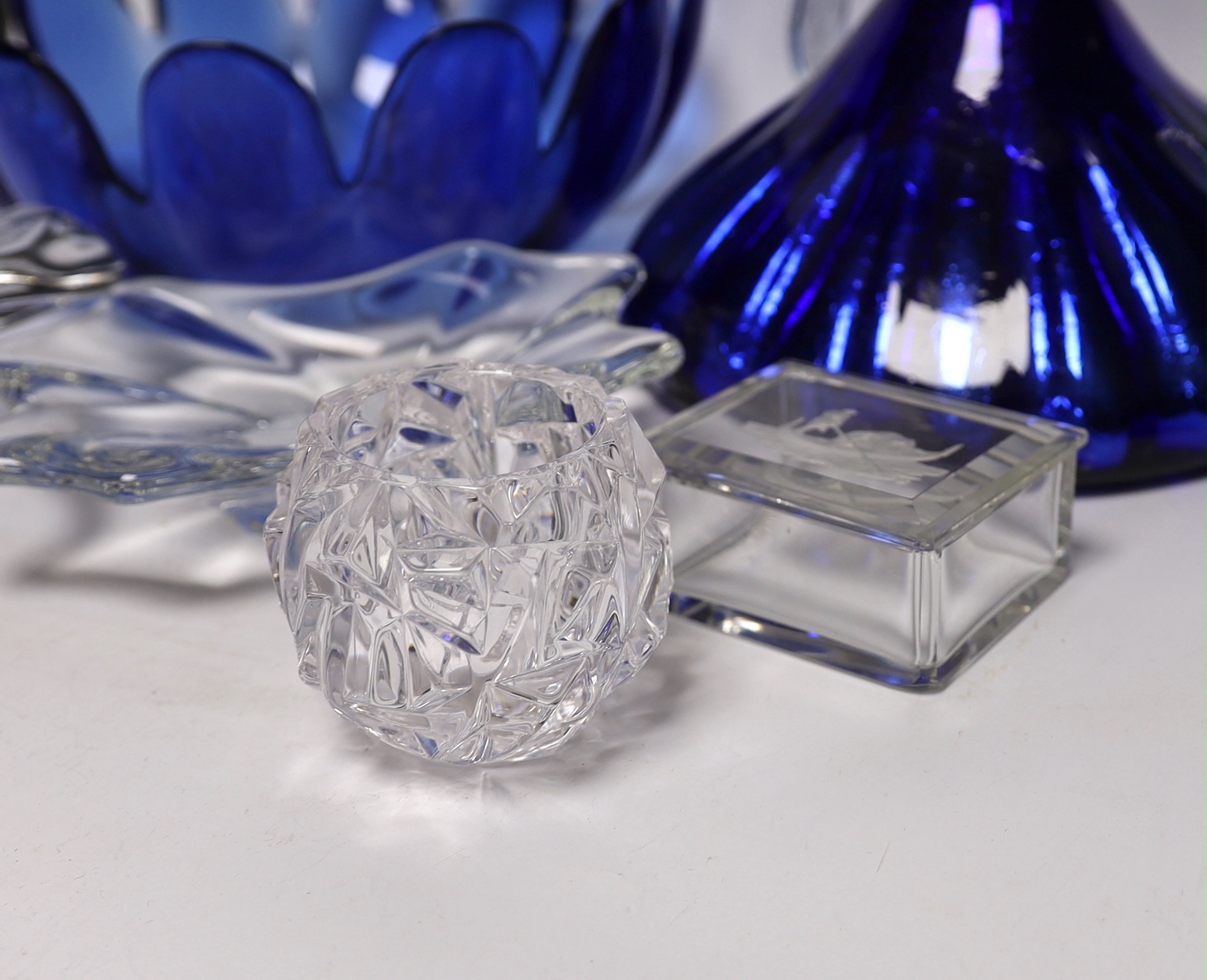 A group of glassware including Small Tiffany vase, two Baccarat dishes and a large blue glass fruit bowl, largest 28cm in diameter